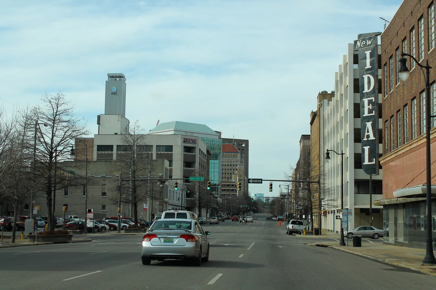 Downtown Birmingham street with cars, sidewalks and the New Ideal building.